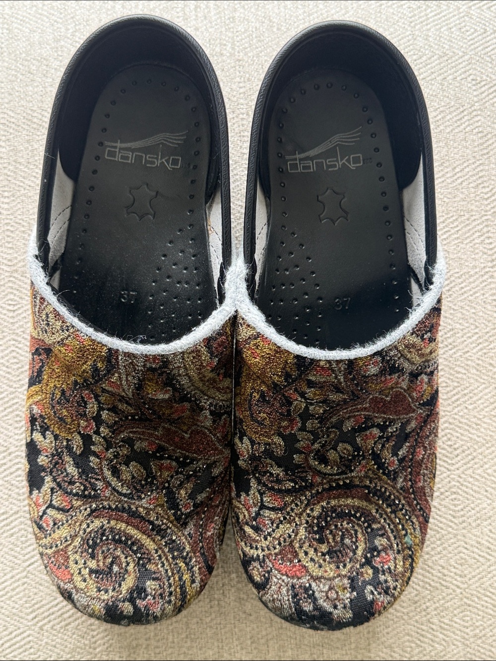 Dansko Paisley Slip-On Clogs in Black, Gold, Brown